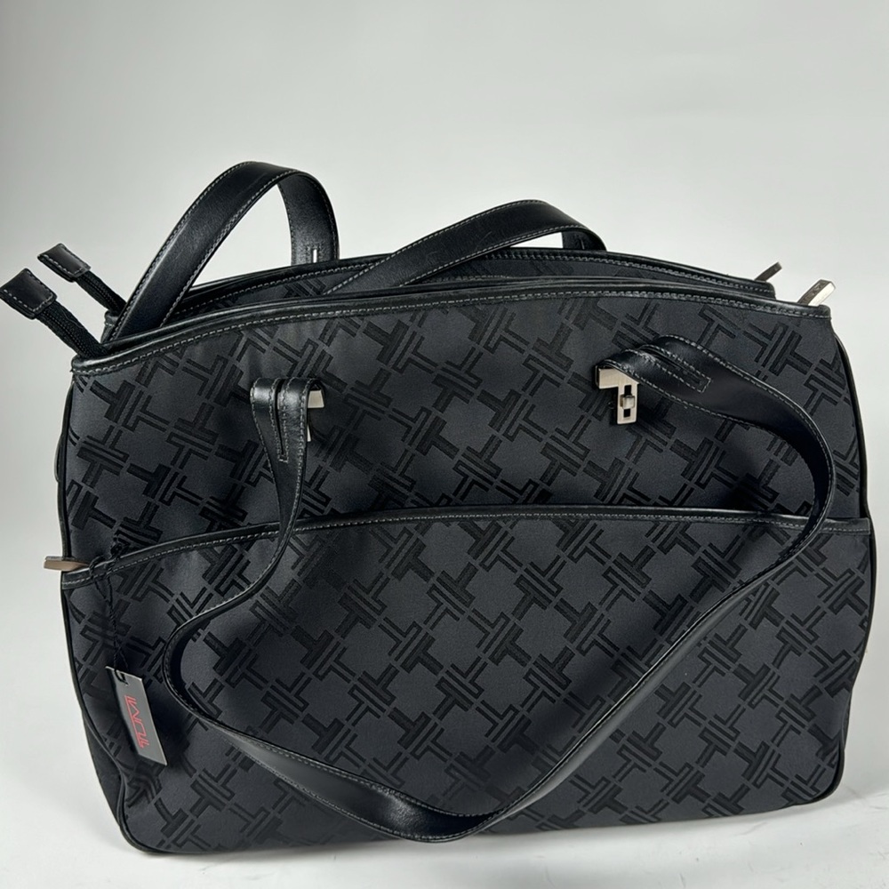 Tumi Medium Tote, black, like new. Still has tag!